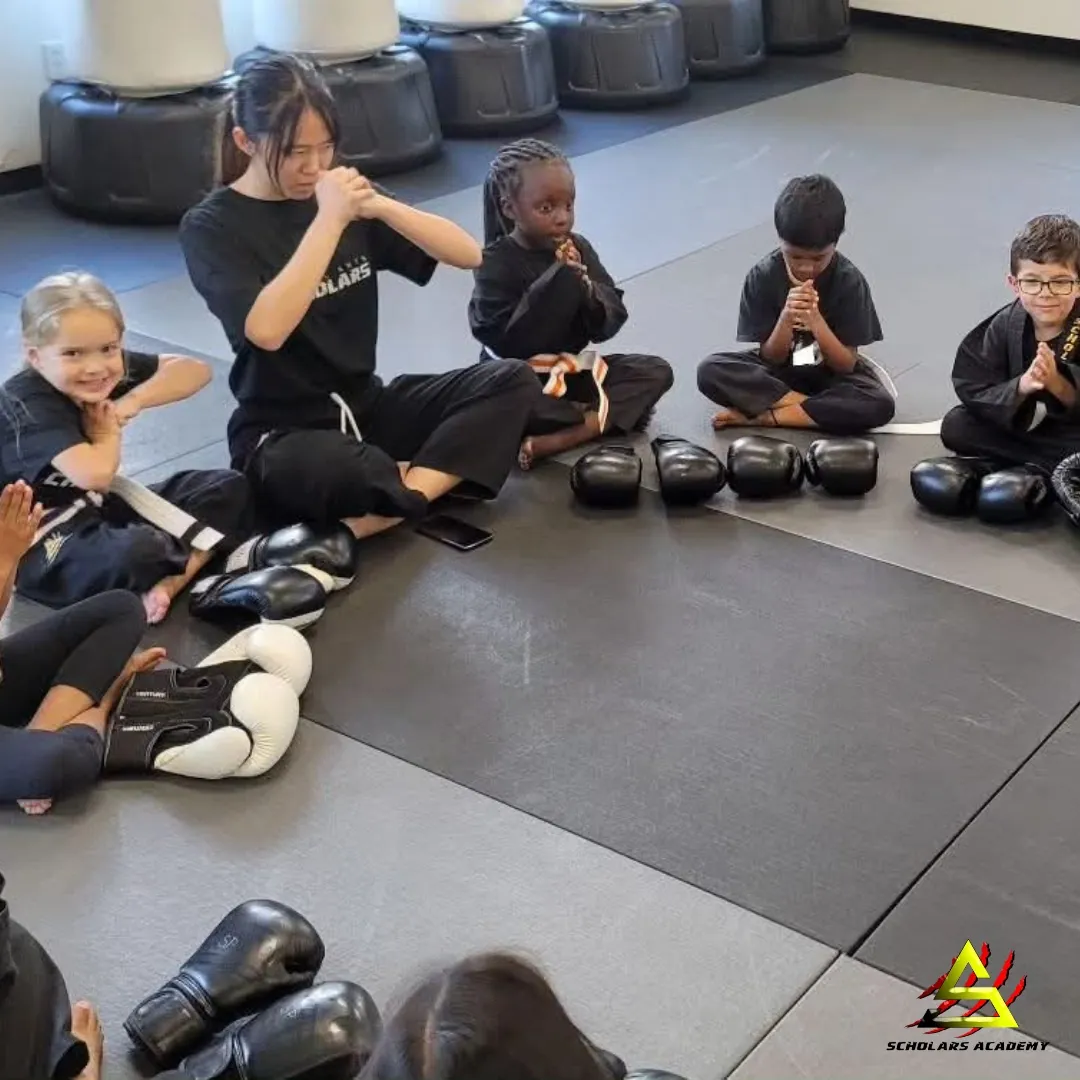Children practicing focus and discipline in a martial arts class at Scholars Academy in Brentwood, CA Children practicing focus and discipline in a martial arts class at Scholars Academy in Brentwood, CA
